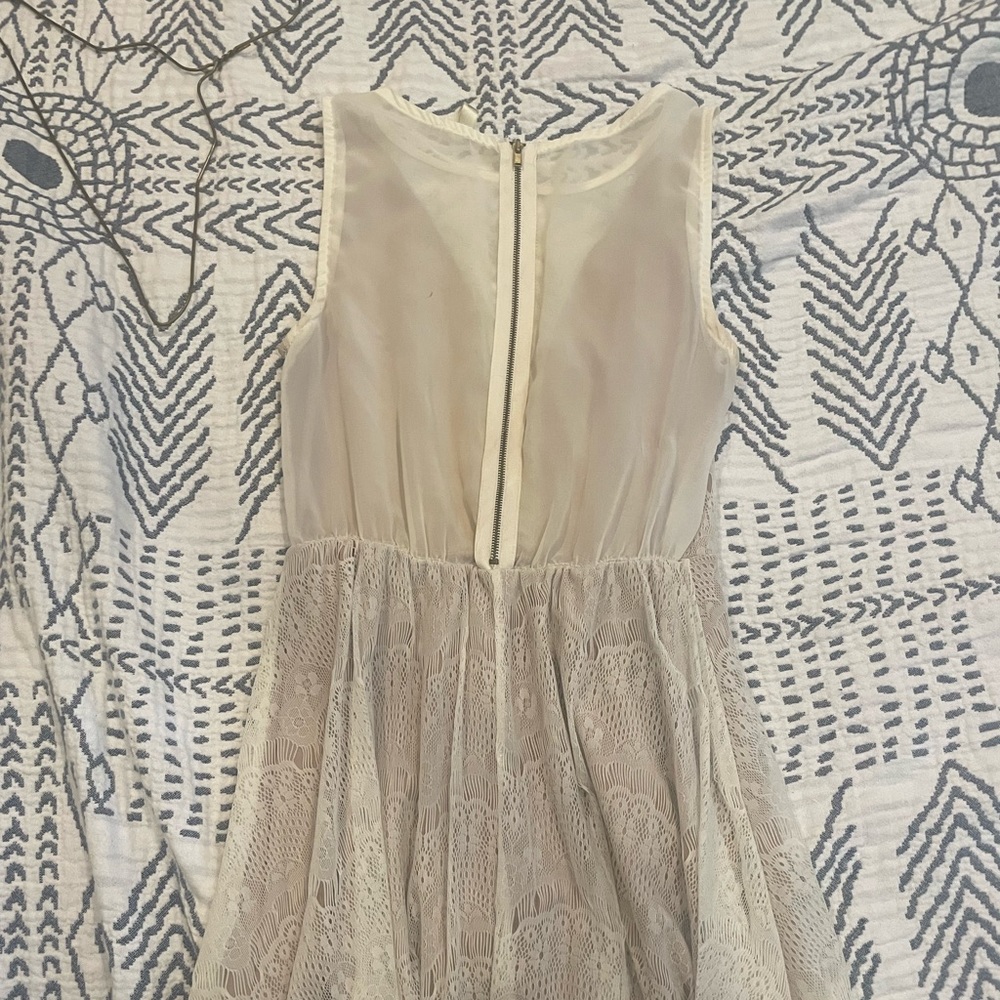 Super cute dress! Can be dressed up or down! Only worn once!